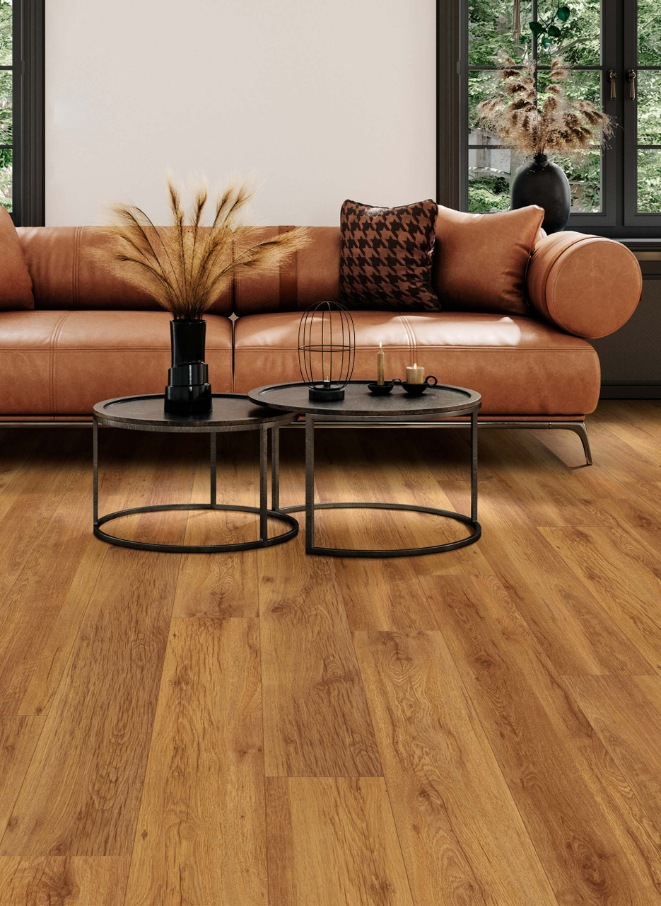 staged living room with medium hue laminate flooring